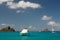 Clear water, island, boats and yachts