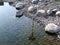 Clear water in the pond, stones, Helsinki, Finland