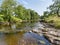 Clear water of the River Ribble near the Yorkshire village of Stainforth