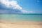 Clear water in the sea, Sunny day, horizon. clear sea water, sandy beach in Sunny weather. with big clouds on the horizon.