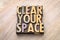 Clear your space - word abstract in wood type