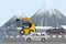 Clearing rubble on highway, construction equipment remove rock from road, flat vector illustration. Couple cars alpine