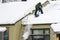 Clearing Snow from a Roof in Quebec