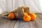 Clementine in a rustic bag on a wooden table