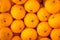 Clementine tangerines or Algerian mandarins texture pattern