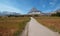 CLEMENTS MOUNTAIN TOWERING ABOVE HIDDEN LAKE HIKING TRAIL ON LOGAN PASS DURING 2017 FALL FIRES IN GLACIER NATIONAL PARK MONTANA US