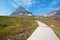 CLEMENTS MOUNTAIN TOWERING ABOVE HIDDEN LAKE HIKING TRAIL ON LOGAN PASS DURING 2017 FALL FIRES IN GLACIER NATIONAL PARK MONTANA US