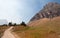 CLEMENTS MOUNTAIN TOWERING ABOVE HIDDEN LAKE HIKING TRAIL ON LOGAN PASS DURING 2017 FALL FIRES IN GLACIER NATIONAL PARK MONTANA US