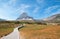 CLEMENTS MOUNTAIN TOWERING ABOVE HIDDEN LAKE HIKING TRAIL ON LOGAN PASS DURING 2017 FALL FIRES IN GLACIER NATIONAL PARK MONTANA US