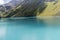 Cleuson dam in Switzerland.with blue water, mirror effect