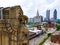 Cleveland\\\'s Guardian\\\'s of Transportations with Cleveland\\\'s downtown and industrial buildings