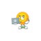 A clever chinese gold coin mascot character working with laptop