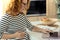Clever pregnant woman spending time on work