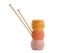 Clews of colorful threads with knitting pins