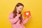 Clicking the like button on a blog post. Heart icon for social media popularity. Excited little girl wearing pink sweatshirt