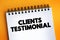 Clients Testimonial text on notepad, concept background