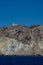 Cliff and and akrotiri lighthouse. blue sky