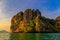 Cliff and coastline in Railay beach, Krabi, Thailand at sunset .