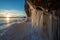 Cliff covered with splash out ice on Baikal lake