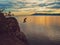 Cliff diving at Kande Beach, Lake Malawi, Malawi