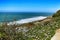 Cliff edge looking at the Atlantic Ocean and covered with vegetation