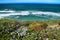 Cliff edge looking at the Atlantic Ocean and covered with vegetation