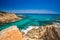 Cliff near Chia beach with azure water, Sardinia, Italy