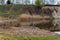 Cliff near the river. Landslide on the river bank