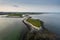 Cliff near Silverstrand beach and car park in Galway city, Ireland. Popular tourist place with stunning view on Galway bay and