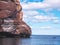 Cliff of rock mountain with thousands of northern gannets Bonaventure Island Gaspesie, Quebec, Canada