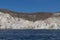 Cliff by the sea in santorini.