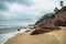 Cliff of Varkala along the coast with red volcanic stones, India