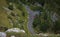 Cliffs of Cheddar Gorge from high viewpoint. High limestone cliffs in canyon in Mendip Hills in Somerset, England