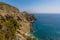 Cliffs fall away to the sea from the Almeria Road on the Costa Tropical, Spain