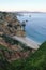 Cliffs, islands and stairs to the beach on the rocky shores of the Atlantic Ocean in the City of Lagos Portugal