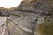 The cliffs at Kilve beach near East Quantoxhead in Somerset, England. Stratified layers of rock date back to the Jurassic era and