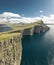 Cliffs in Leitisvatn lake and Sorvagsvatn on Vagar island aerial view