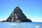 Cliffs of Point Wild, Elephant Island, Antarctica, with Zodiac in front