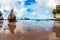 The cliffs reflected in the tidal waters