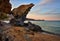 Cliffs on sand beach, Agios Ioannis, island Limnos, Greece.