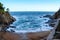 Cliffs on the shore of the sea in Tossa de Mar, Spain