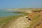 Cliffs and stone beach ith algae of the French Opal north sea coast near Wimereux