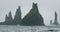 The cliffs and waves at the black sand beach, Reynisfjara in Vik, Iceland