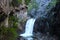 Cliffside steps near waterfall