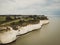 Clifftop view of the bride & groom taken from above