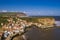 Clifftop view of the cottages and harbour in Staithes, North Yorkshire.