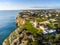 Cliffy coast with Alfazinha Lighthouse in Carvoeiro, Algarve, Portugal