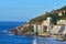 Clifton, Cape Town, South Africa panorama seascape with clear blue sky, hotels, and apartment buildings in the