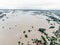 Climate change and the effects of global warming. Flooded village, farms and fields after heavy rains