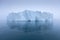 Climate change and global warming. Icebergs from a melting glacier in Greenland. UNESCO